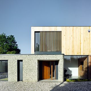 Exterior of house with tree and sky