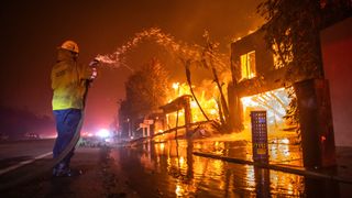 Firefighter putting out California fire 