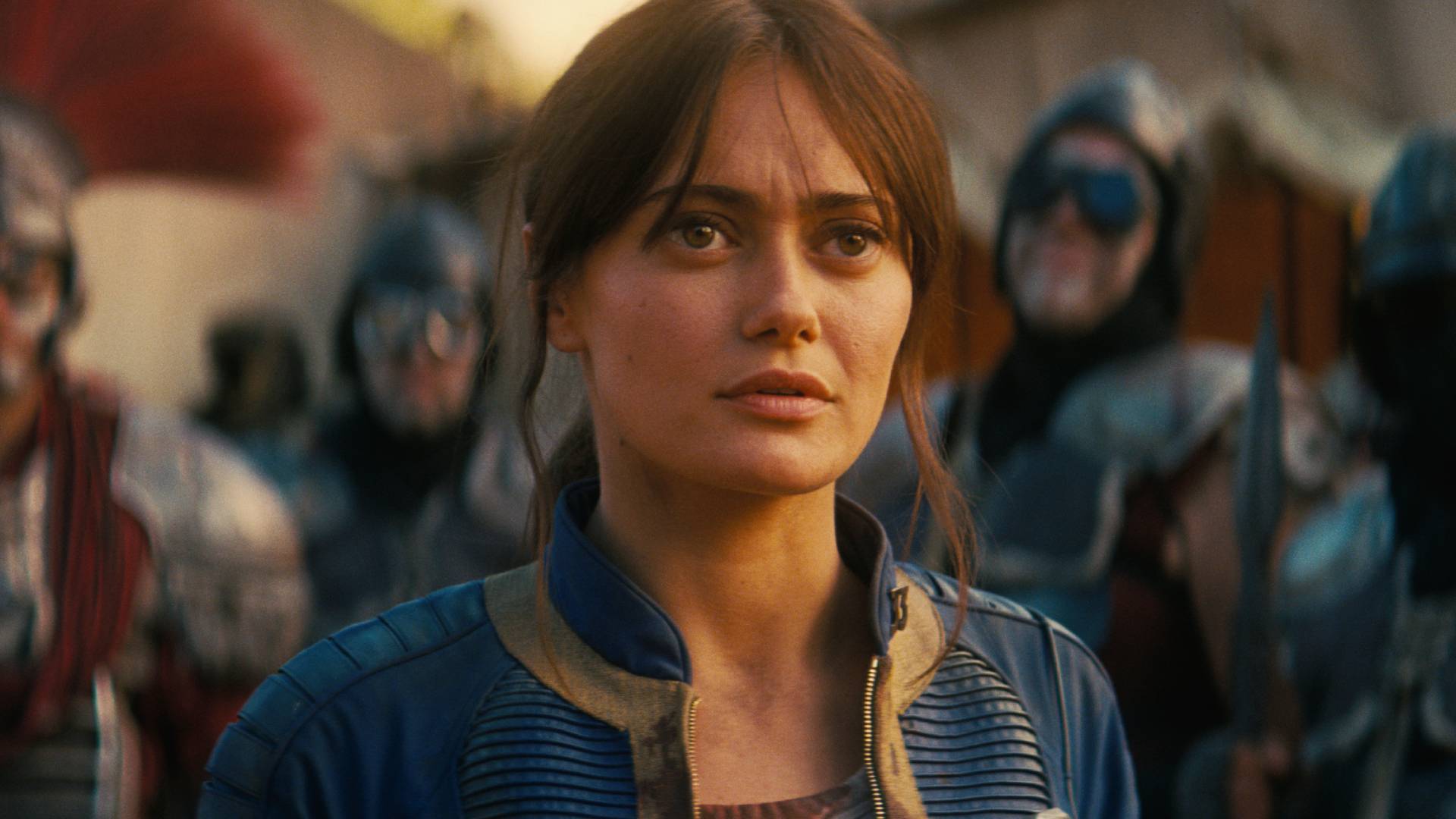 Ella Purnell as Lucy Maclean in Fallout season 2, surrouned by Caesar's Legion