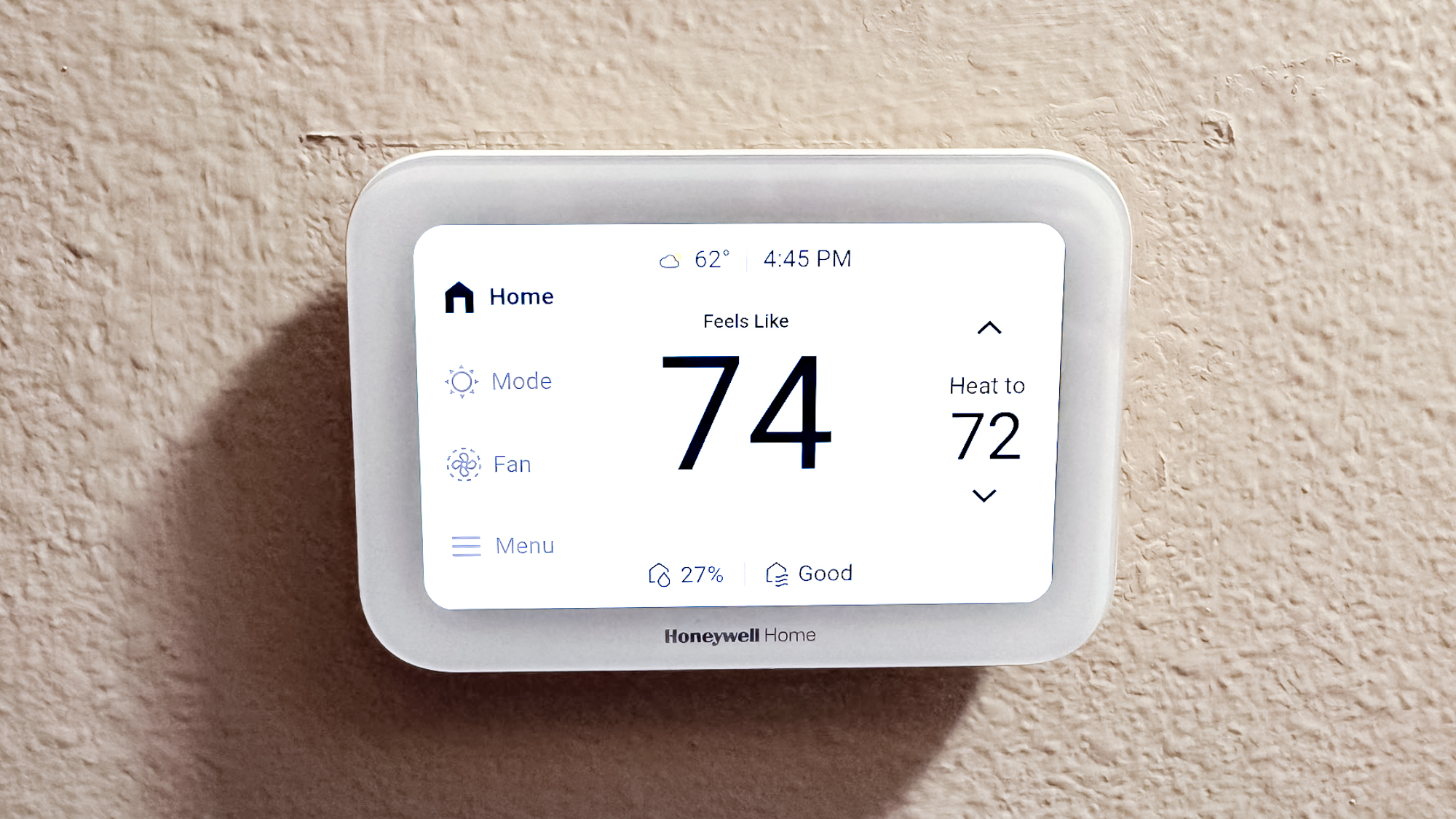 Honeywell Home X8S Smart Thermostat mounted to a hallway wall