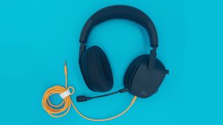 The Glorious GHS Eternal and GHS Eternal RGB wired gaming headsets in white and black, seen from various angles.