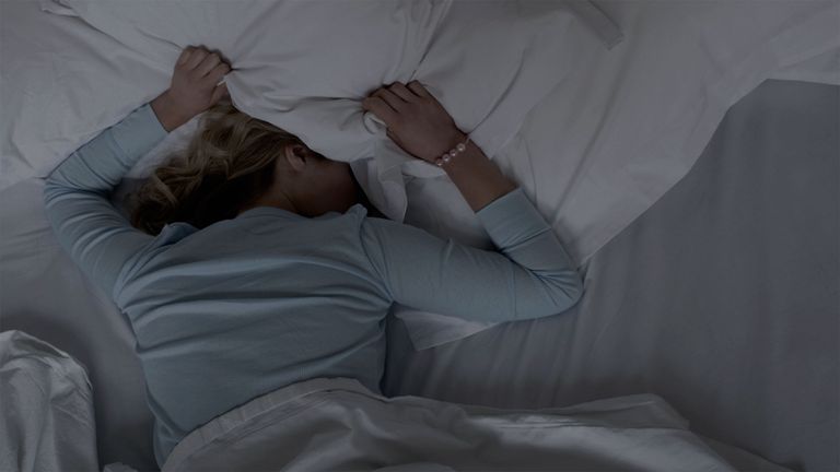 A woman unable to sleep