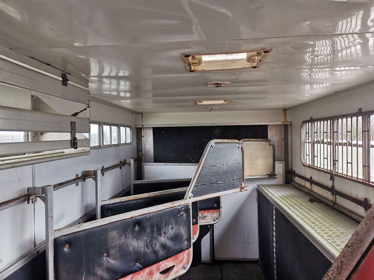The inside of the caravan shows scrap being kept inside