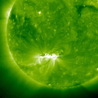 This image of the active sunspot group 1121 on the sun shows the solar hotspot as a bright white region in the lower left as seen by the sun-watching SOHO space observatory on Nov. 5, 2010.