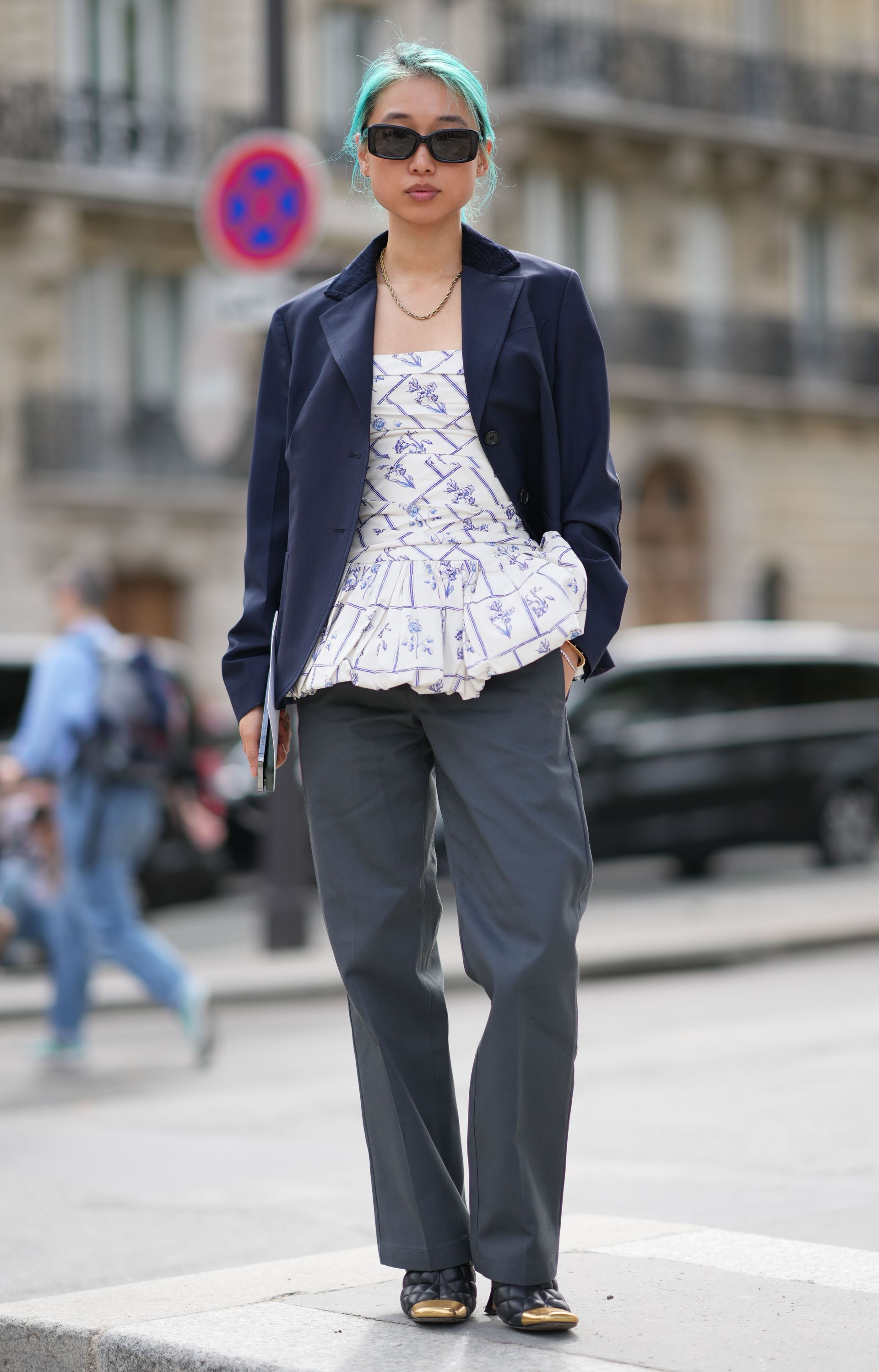 Woman in peplum top and pants