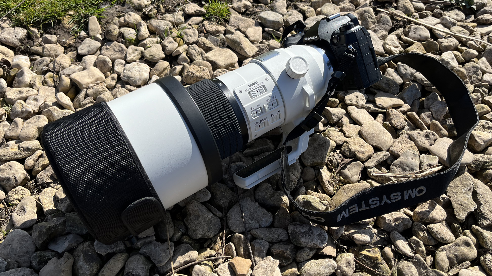Mike Harris holding OM System M.Zuiko 150-400mm f/4.5 TC1.25x IS PRO at Slimbridge Wetland Centre