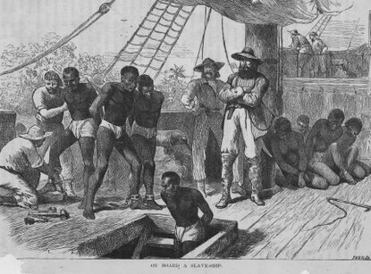 Slaves are loaded onto a ship around 1835.