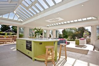 a kitchen conservatory extension with bi-fold doors