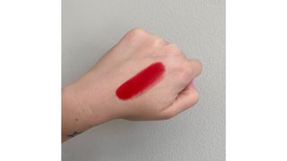 Swatch of Dior Rouge Dior 999 red lipstick