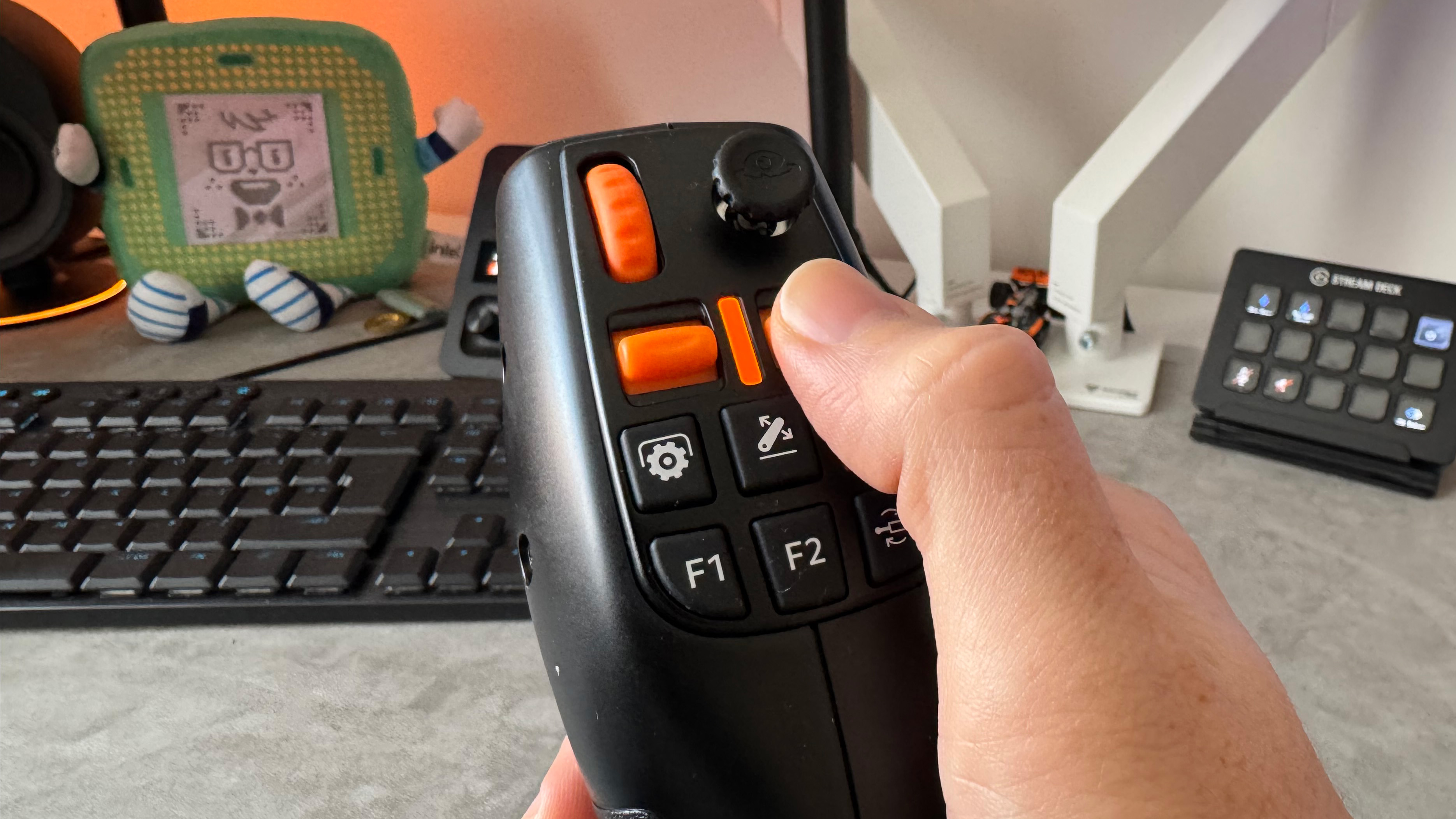 The Thrustmaster SimTask Farmstick on a desk