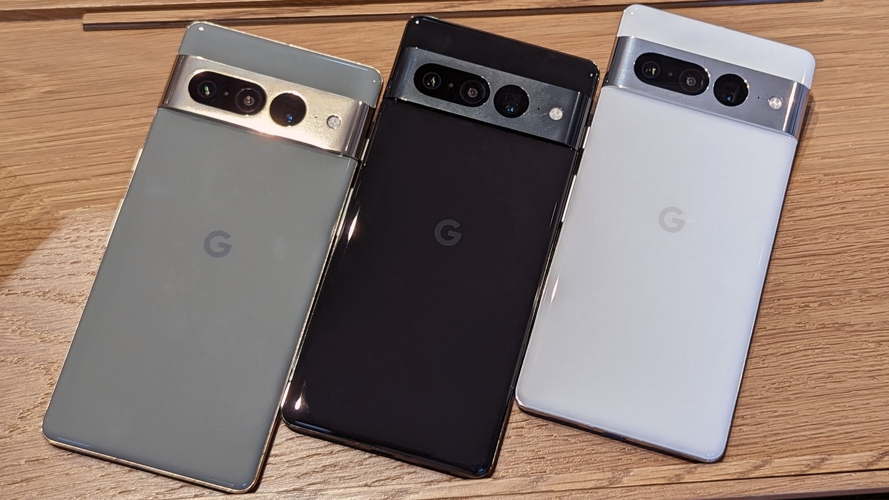 All the colors of the Google Pixel 7 Pro on a wooden table at Google's fall 2022 event