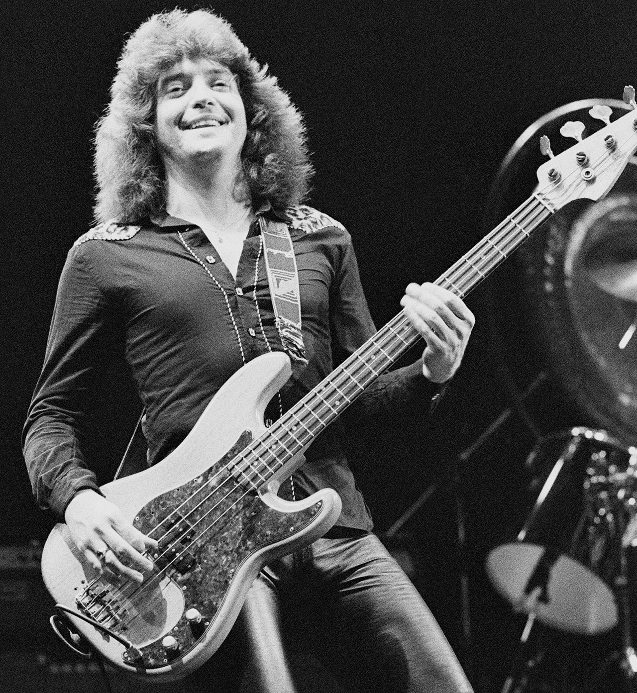 SOUTHAMPTON, ENGLAND - 20th OCTOBER: Bassist Bob Daisley performs live on stage with Ozzy Osbourne at the Gaumont Theatre in Southampton, England on 20th October 1980. (Photo by Fin Costello/Redferns)