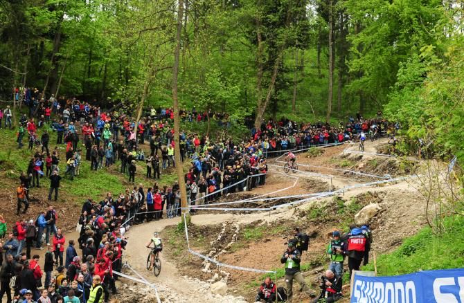 Riders snake their way up switchbacks