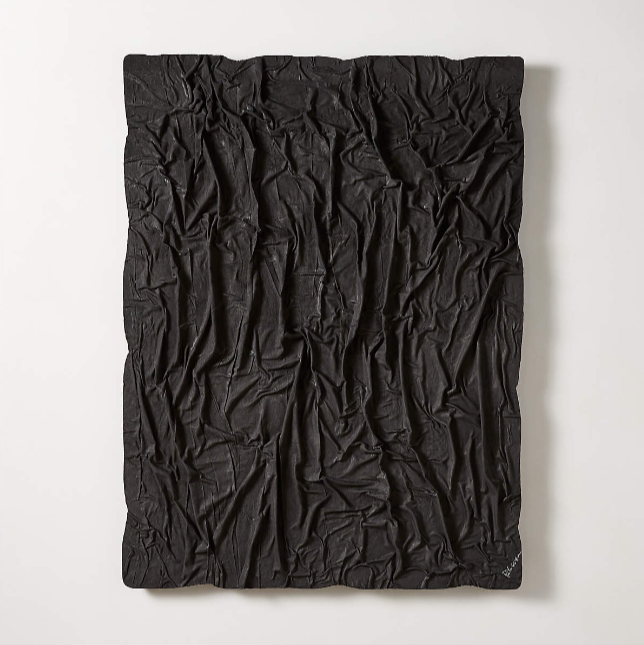 Black textured wall art.