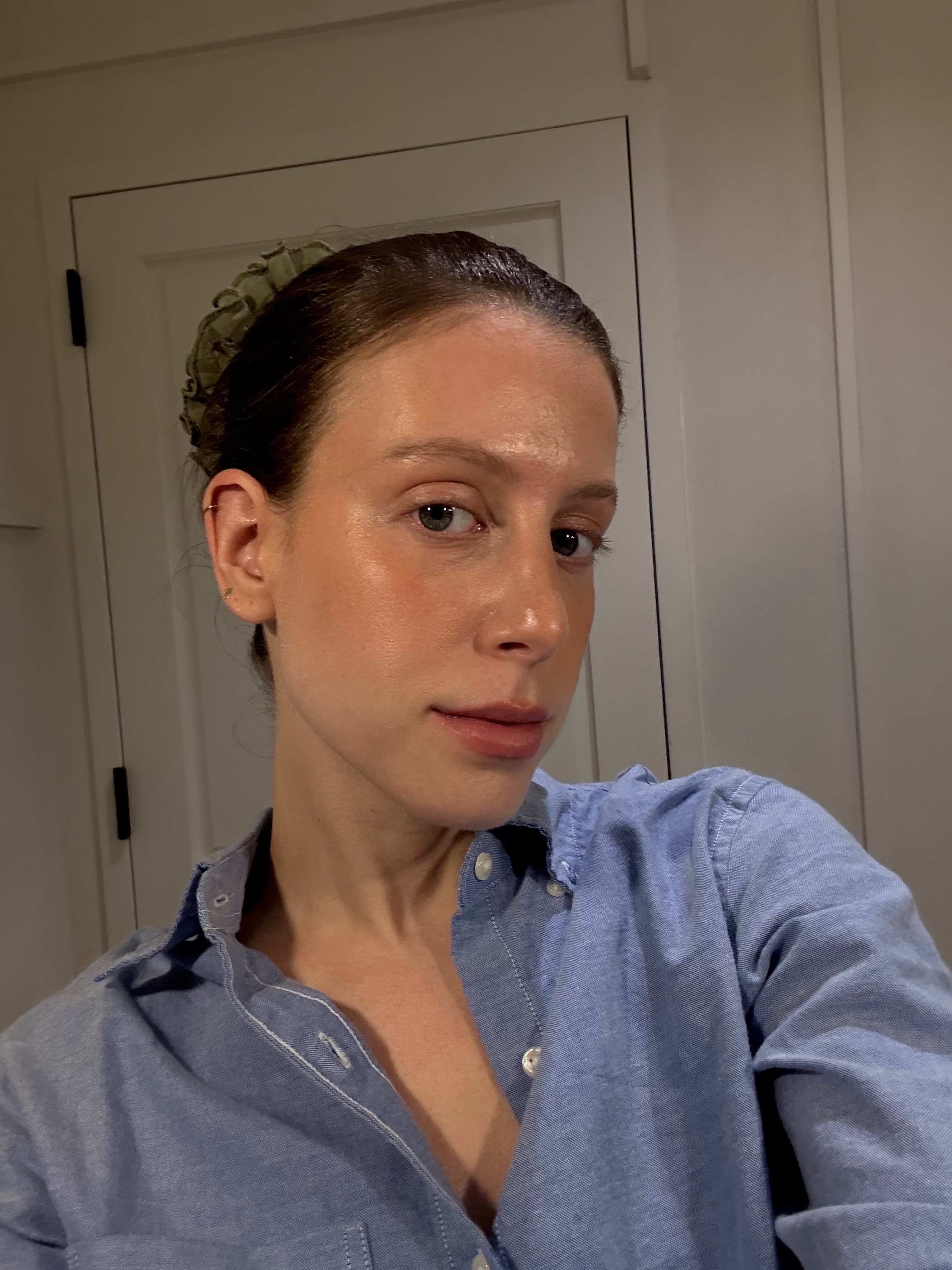 Jamie Schneider testing Bella Hadid's slicked-back bun hack