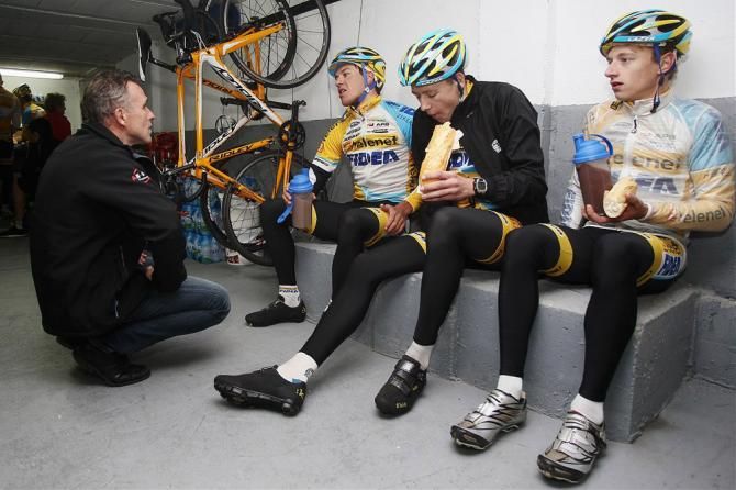 Telenet-Fidea manager Danny De Bie chats with Tom Meeusen, Quinten Hermans and Nicolas Cleppe at the team's Mallorca training camp