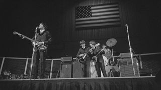 The Beatles perform at the Cow Palace in Daly City, California, during their Summer 1964 United States and Canada Tour, 19th August 1964. Left to right: Paul McCartney, George Harrison, John Lennon and Ringo Starr. (Photo by William Lovelace/Daily Express/Hulton Archive/Getty Images)
