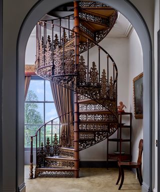 A wooden stair railing idea with carved details