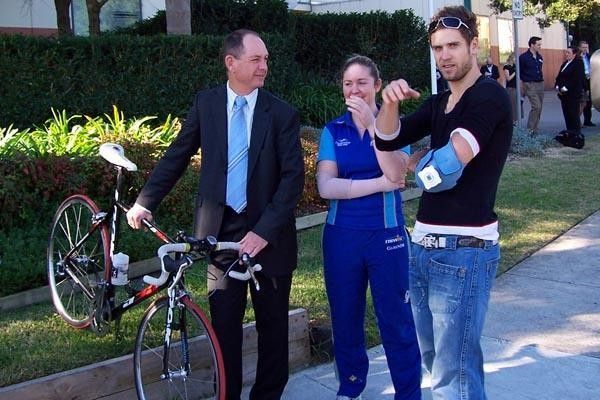 Kevin and Kate Nichols pose for a photo with Ben Kersten