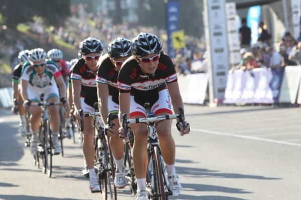 The BikeExchange women chase Cromwell and Hosking
