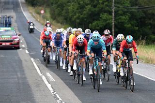 PUERTO DE ANCARES SPAIN AUGUST 30 LR Mauro Schmid of Switzerland and Team Jayco AlUla Nicolas Vinokurov of Kazakhstan and Team Astana Qazaqstan and Sylvain Moniquet of Belgium and Team Lotto Dstny compete in the breakaway during the La Vuelta 79th Tour of Spain 2024 Stage 13 a 176km stage from Lugo to Puerto de Ancares 1659m UCIWT on August 30 2024 in Puerto de Ancares Spain Photo by Dario BelingheriGetty Images