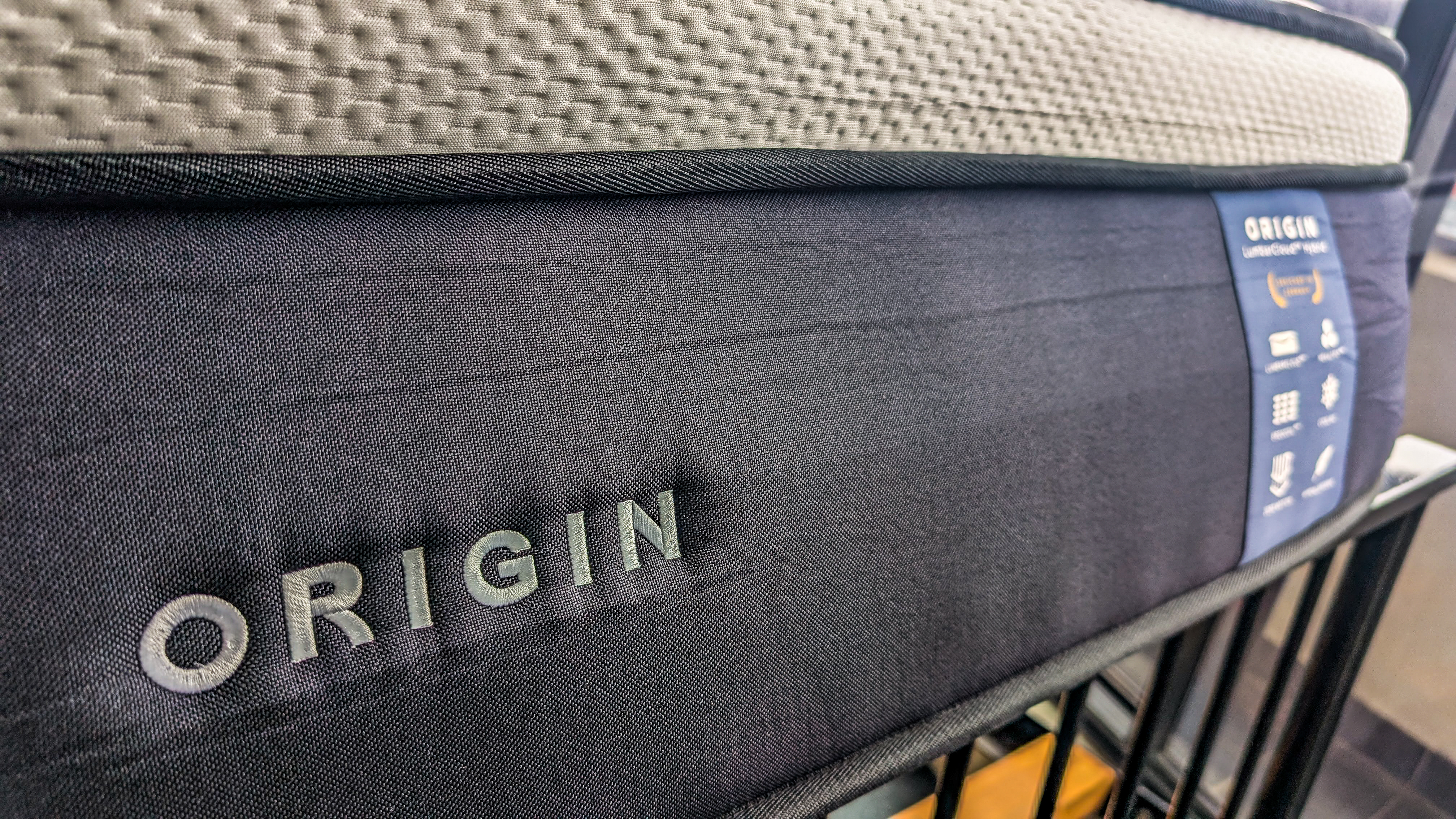 Branding on the side of the Origin LumbarCloud mattress