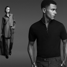 Two models wearing Hugo Boss clothing in black and white