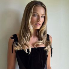 A photo of Margot Robbie with blonde highlights
