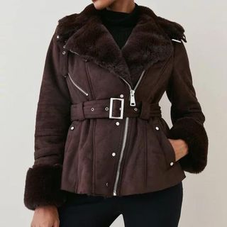 model wearing a brown karen millen shearling biker leather jacket