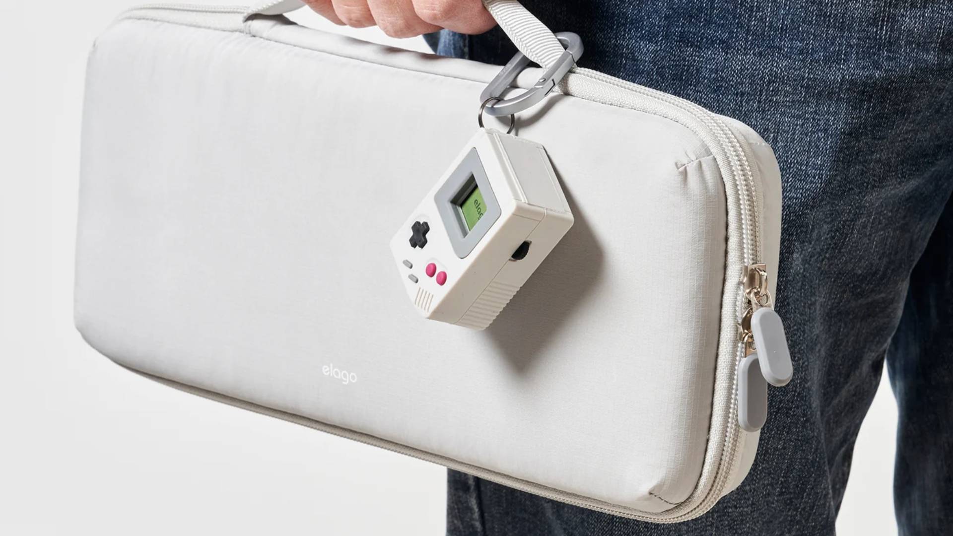 Official marketing image showing the elago Switch Game Case attached to a elago Switch case.