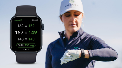 Female golfer looking at apple watch