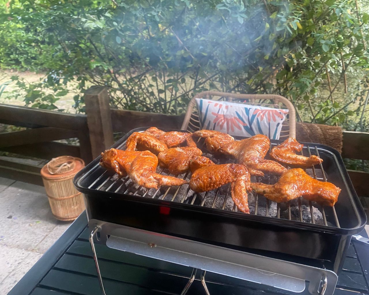Weber Smokey Joe with chicken wings cooking