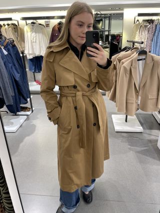 Woman wears Zara Trench Coat