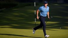 Rory McIlroy runs off the green at the 2022 US Open
