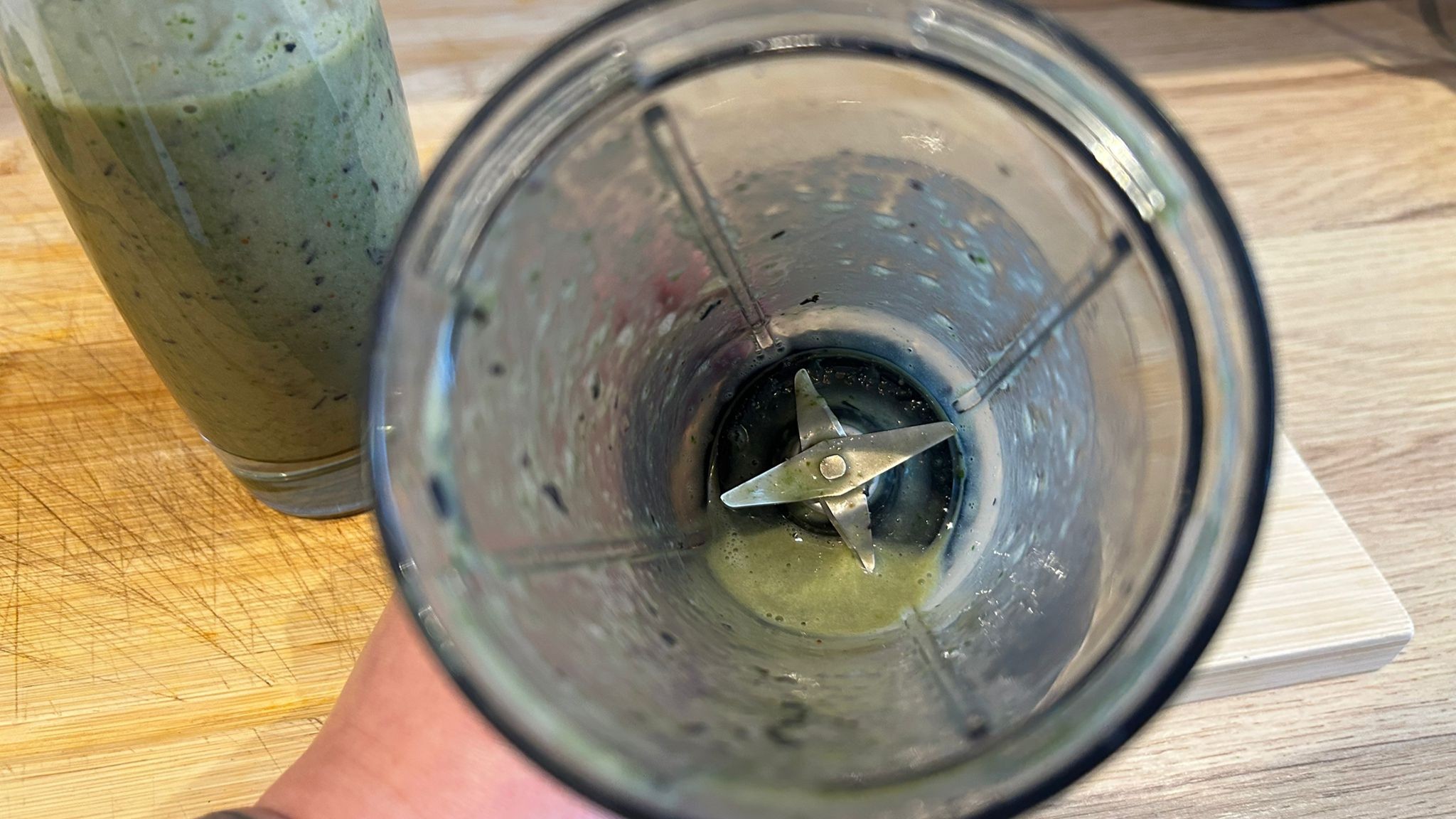 Nutribullet Flex blender containing remnants of banana kale smoothie
