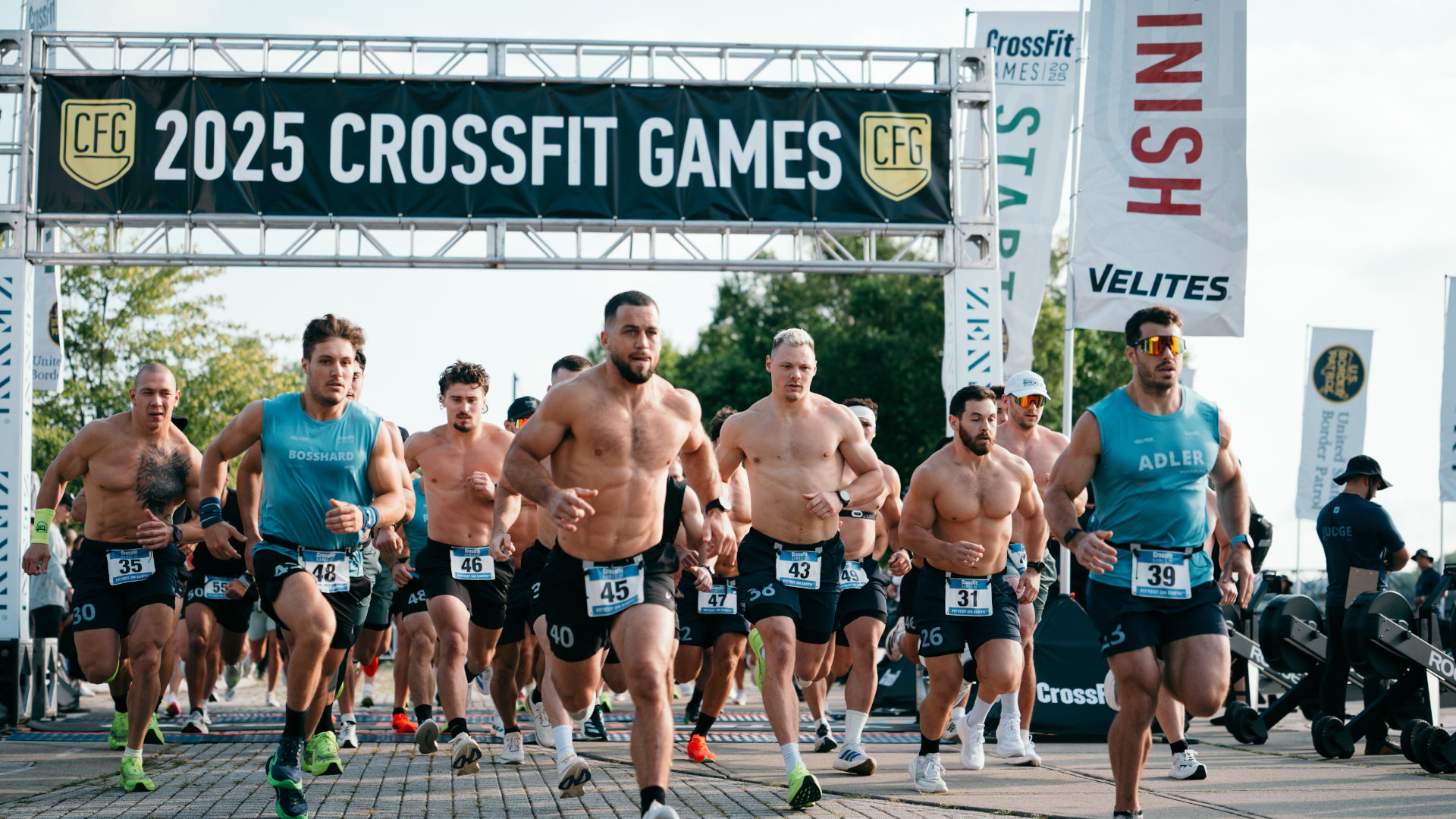 CrossFit athletes taking off from the start line for the run, row, run event at the 2025 Games