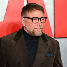 Guy Ritchie in dark rimmed glasses