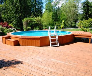 above ground pool with wooden deck