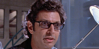 Dr. Ian Malcolm (Jeff Goldblum) stands in a Jurassic Park laboratory.