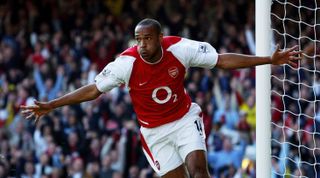 LONDON - OCTOBER 18: Thierry Henry of Arsenal celebrates scoring the second goal for Arsenal during the FA Barclaycard Premiership match between Arsenal and Chelsea on October 18, 2003 at Highbury in London, England. (Photo by Shaun Botterill/Getty Images)