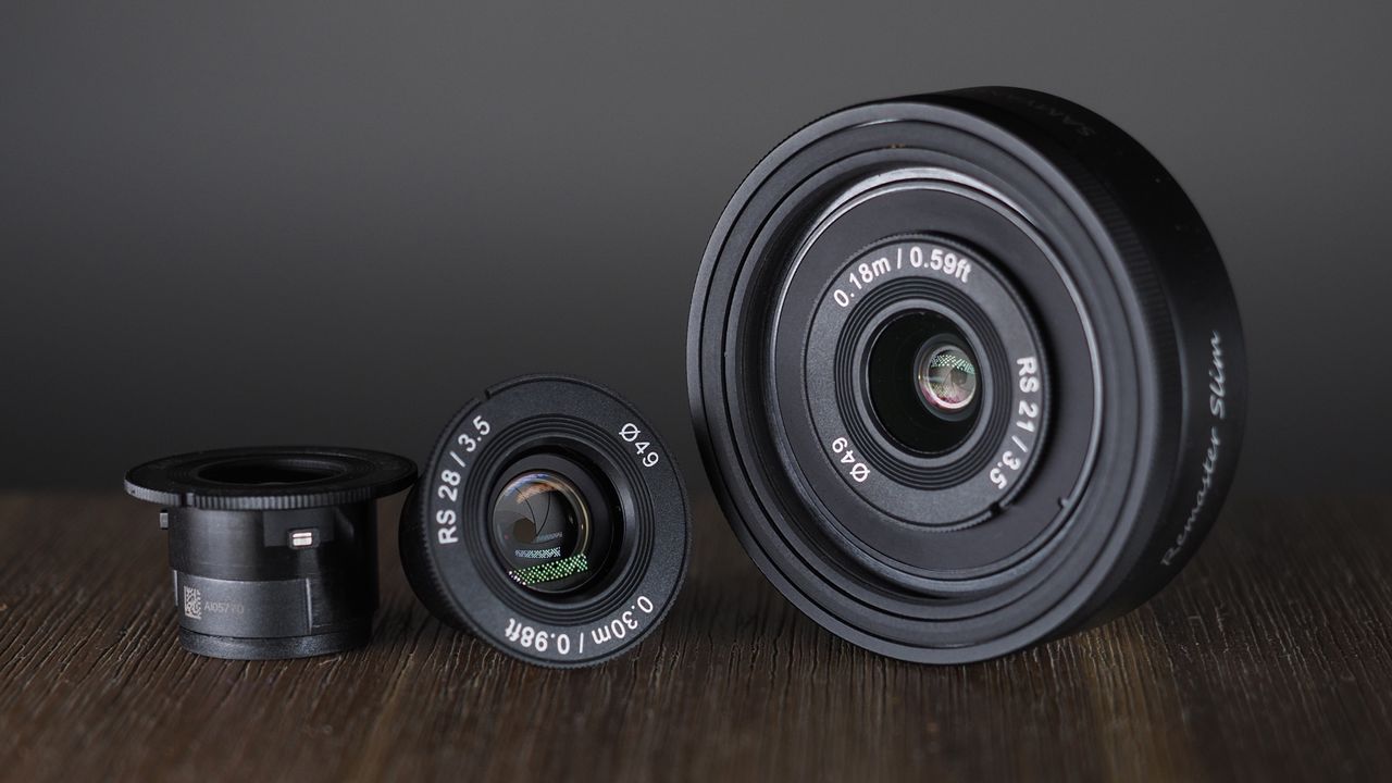 Samyang Remaster Slim module with lenses on a wooden surface