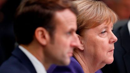 Emmanuel Macron and Angela Merkel © ADRIAN DENNIS/AFP via Getty Images