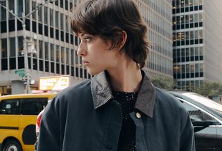 A Zara model wearing a contrast-collar barn jacket on the streets of New York City.