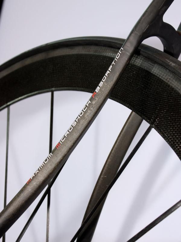 Flax fibers strategically placed throughout the frame supposedly absorb more road shock than carbon fibers alone.