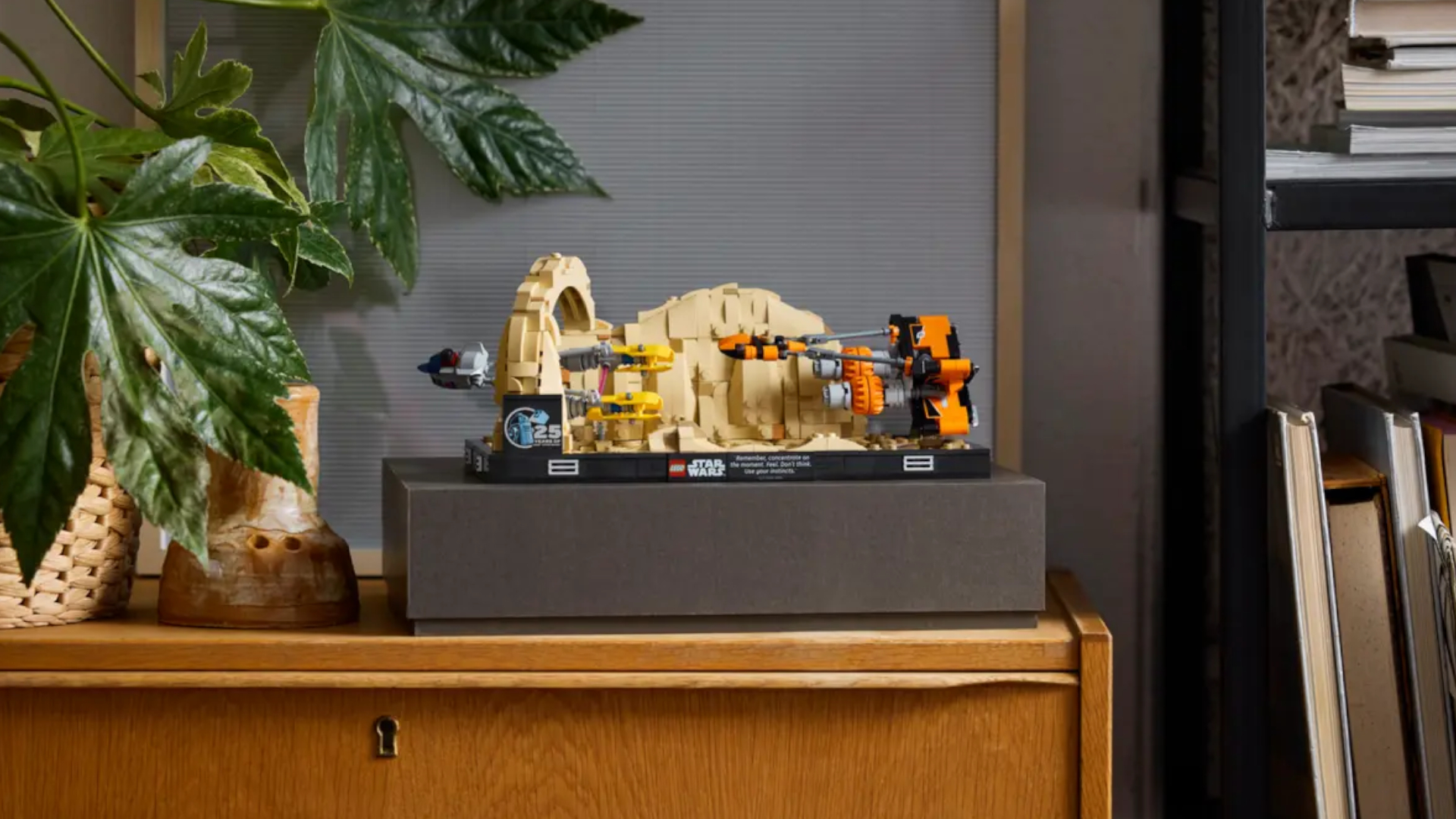 Lego Mos Espa Podrace Diorama  on a shelf, seen side-on
