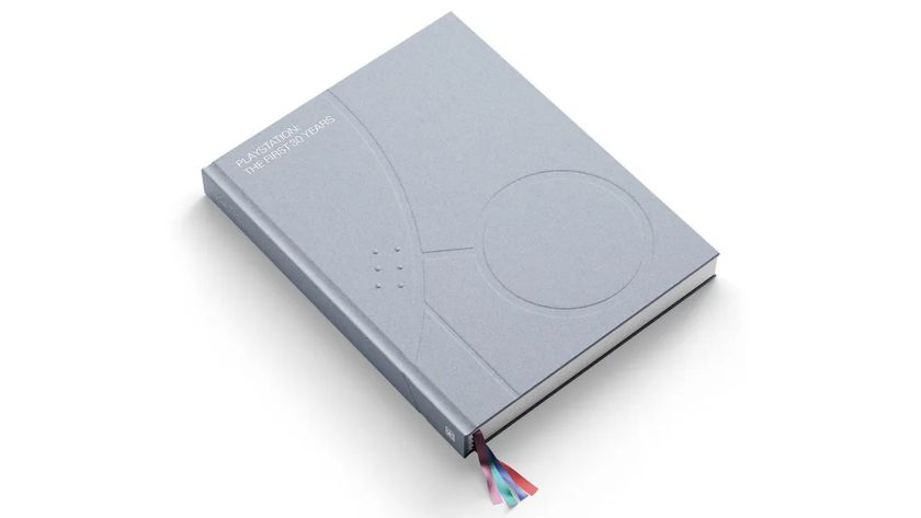 A photo of the book PlayStation: The First 30 years on a white background