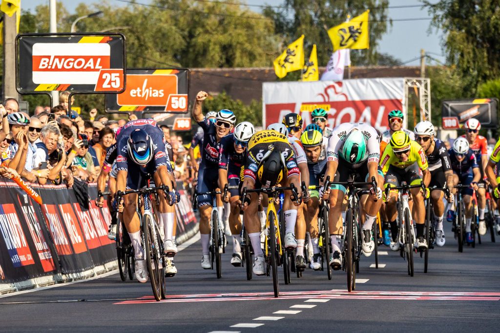 Belgian Jasper Philipsen of AlpecinFenix L wins before Dutch Dylan Groenewegen of Team JumboVisma C and Estonian Martin Laas of BoraHansgrohe R the sprint at the finish of the 105th edition of the Kamioenschap van Vlaanderen one day cycling race 1953 km from Koolskamp to Koolskamp Friday 17 September 2021 the eighth stage out of 9 of the Bingoal cycling cup BELGA PHOTO KURT DESPLENTER Photo by KURT DESPLENTERBELGA MAGAFP via Getty Images