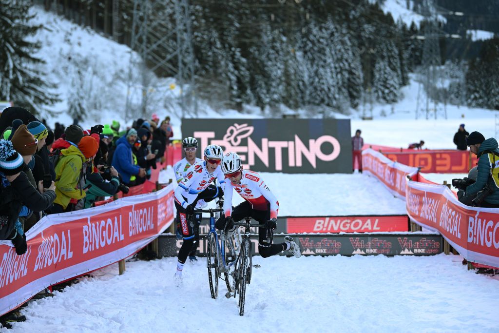 VAL DI SOLE ITALY DECEMBER 10 LR Eli Iserbyt of Belgium and Team Pauwels Sauzen Bingoal and Michael Vanthourenhout of Belgium and Team Pauwels Sauzen Bingoal compete during the 3rd UCI Cyclocross World Cup Val di Sole 2023 Mens Elite on December 10 2023 in Val di Sole Italy Photo by Dario BelingheriGetty Images