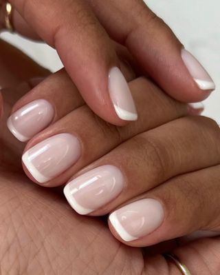 A milky french manicure by Iram Shelton