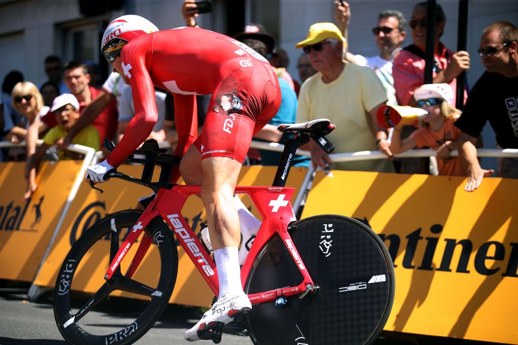 Stefan Kung bearing the scars of his earlier crash